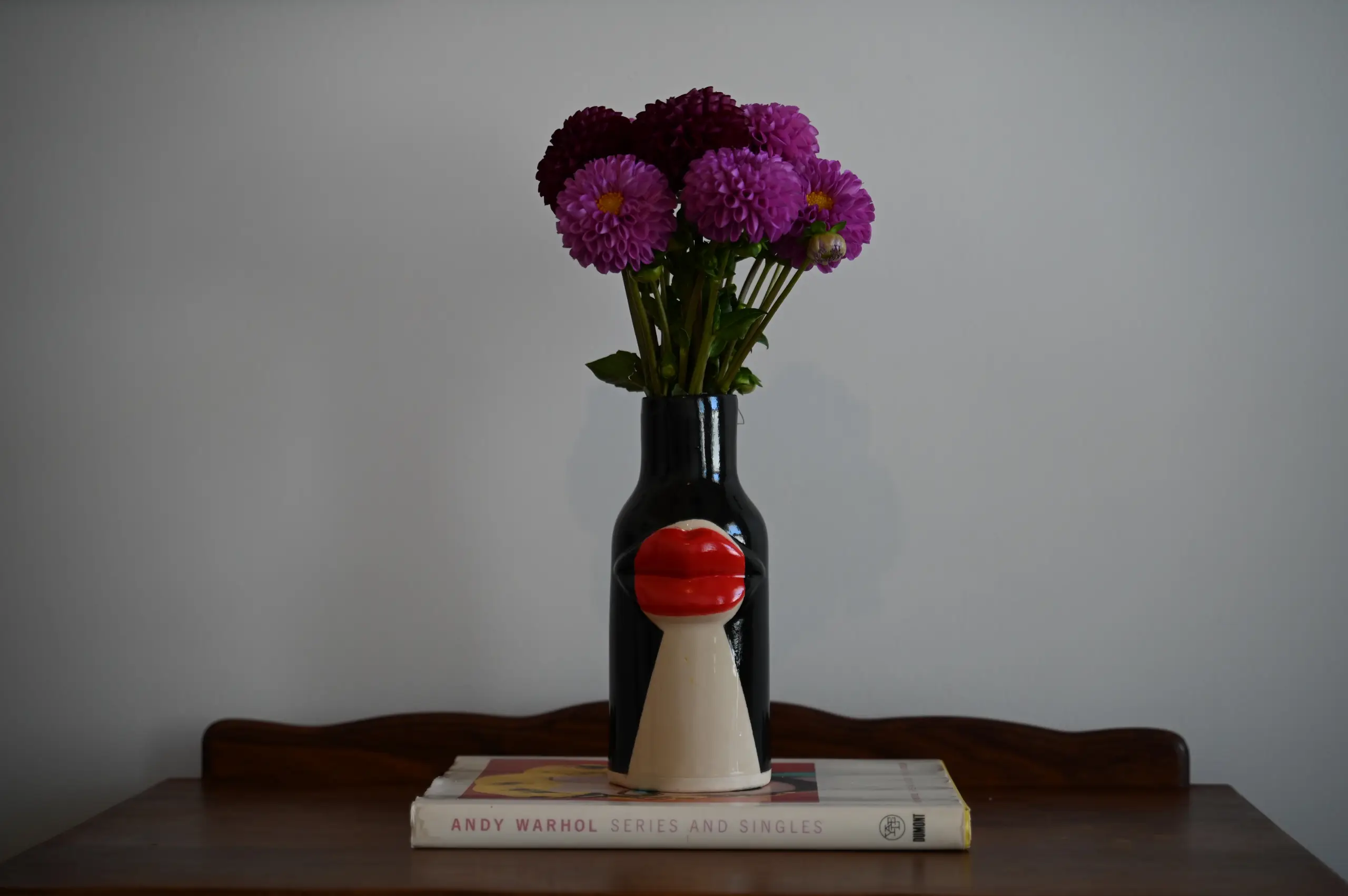 Detail shot of linen fabrics and ceramic pottery